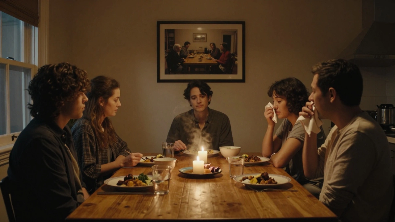 Five people eating together in silent communion in a warm, candlelit kitchen.