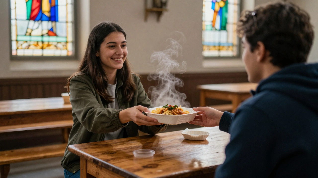 A person being handed a hot meal by a volunteer in a quiet church setting.