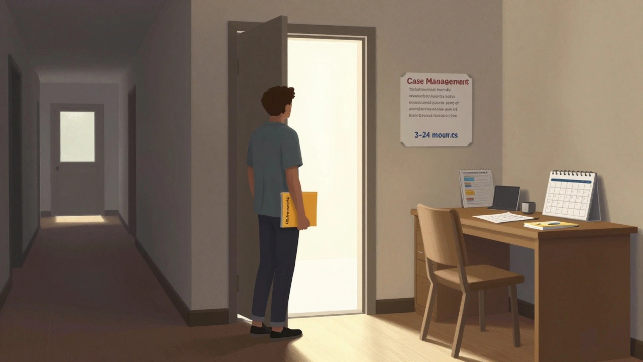 Person transitioning from dark shelter corridor to bright transitional housing room.